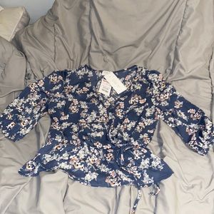 Blue floral wrap top
